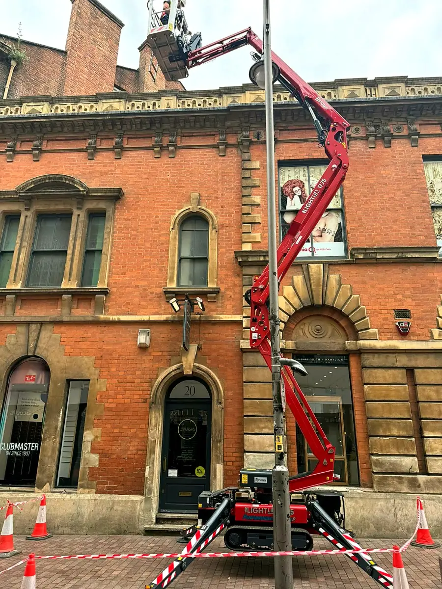 Baseline Platforms operator working from the Hinowa 17.75 fully extended to a heritage rooftop on Hotel Street, Leicester